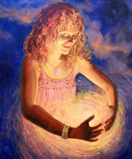 A smiling woman holds a brilliant golden sphere against her body.