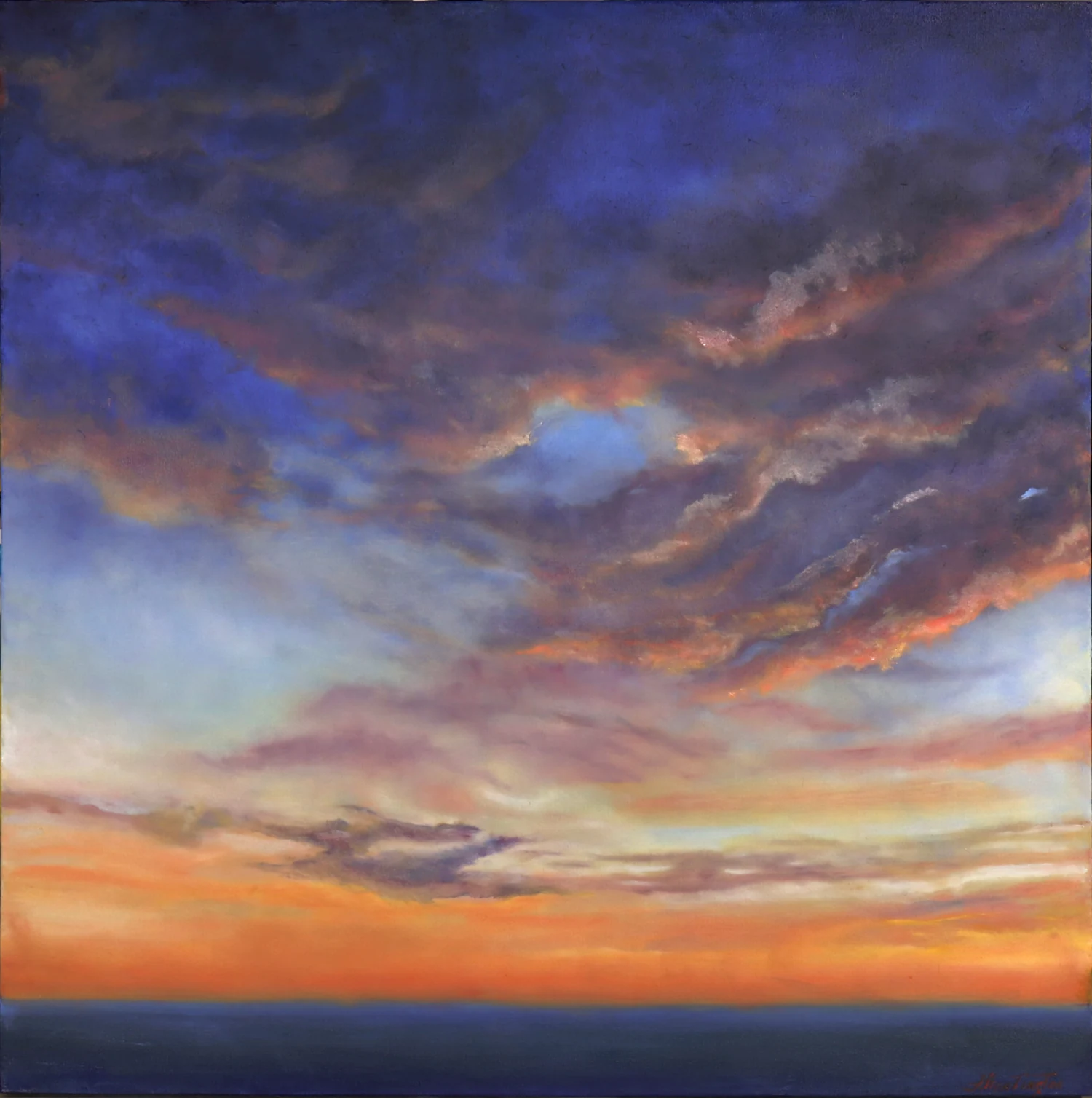 Soft violet and blue clouds stretch above a bright orange horizon.